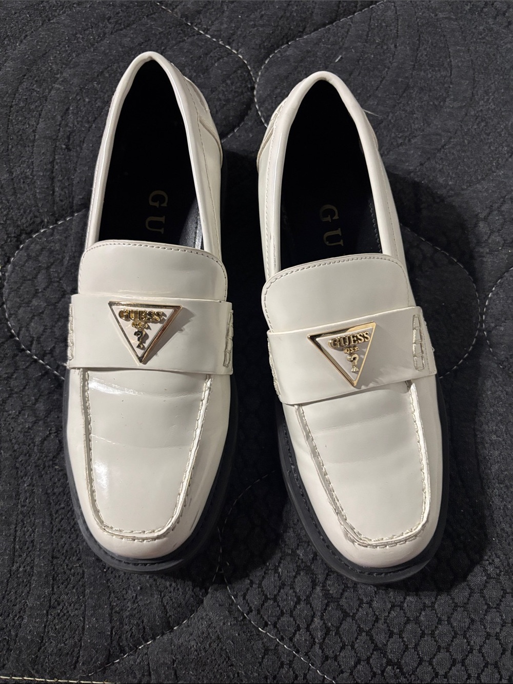 GUESS women’s Cream Leather Loafers with Gold Triangle Logo